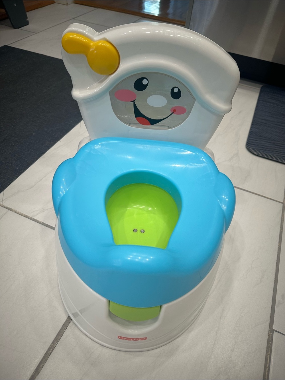 Fisher-Price Blue and Green Toddler Training Potty with Smiling Backrest